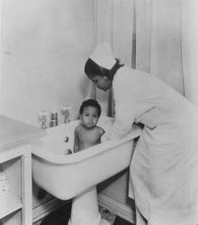 Bathing a child at Florence Home