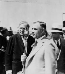 Lou Holland, Conrad Mann and other unidentified people at airport dedication